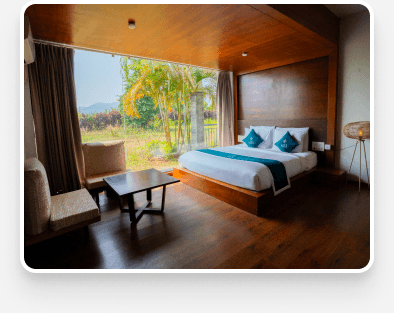 Warm wood-paneled bedroom with garden view