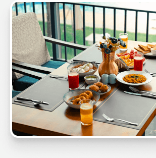 Outdoor breakfast table with curated dishes
